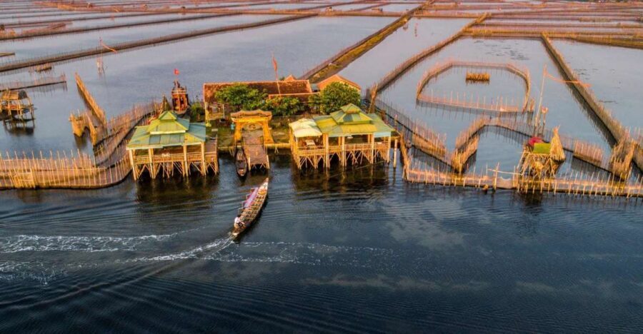 Hue: Half-Day Yellow Tam Giang Lagoon Sunset Tour - Passing Thuan An Beach and heading toward Tam Giang Bridge